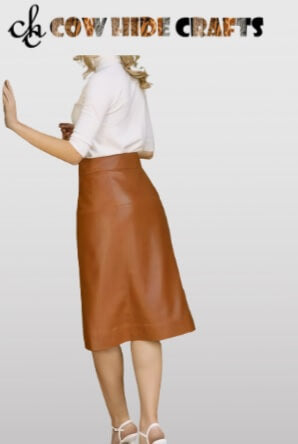 Button Closure knee length tan leather skirt.