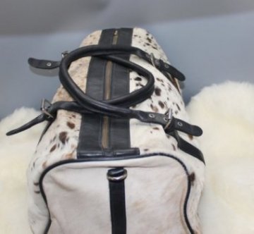 Leather overnight duffle bag for camping with dual handles and long strap