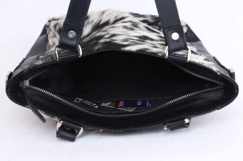 Black and white cowhide bag Australia with inside zipper pocket