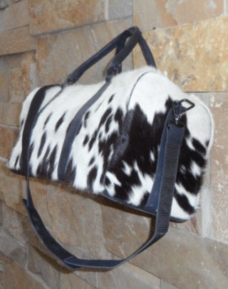 Unisex cowhide sports bag zipper closure