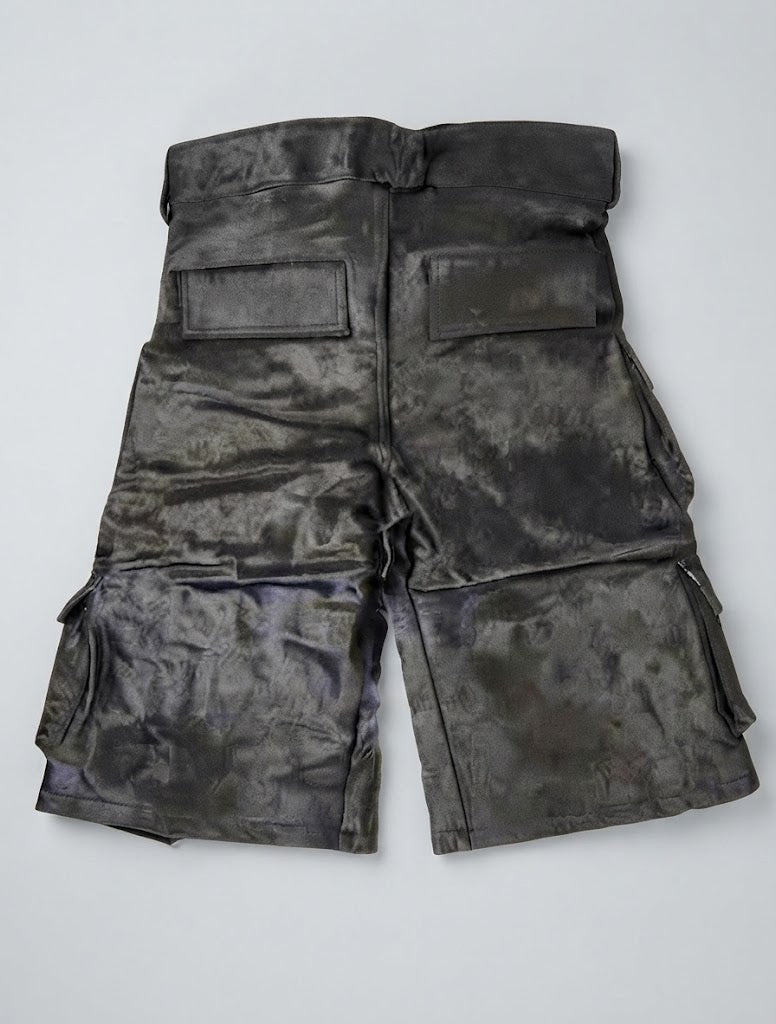 Rear flap pocket detail on men's black cowhide cargo shorts