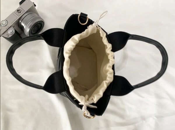 Black patchwork bag drawstring interior