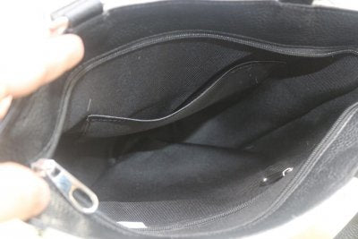 Black white cowhide bag top zipper closure