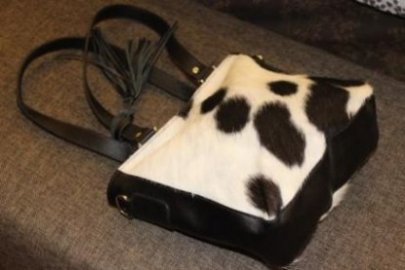 Black and white cowhide partywear shoulder purse