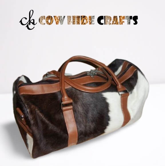 Brown cowhide duffle side zipper pockets both sides