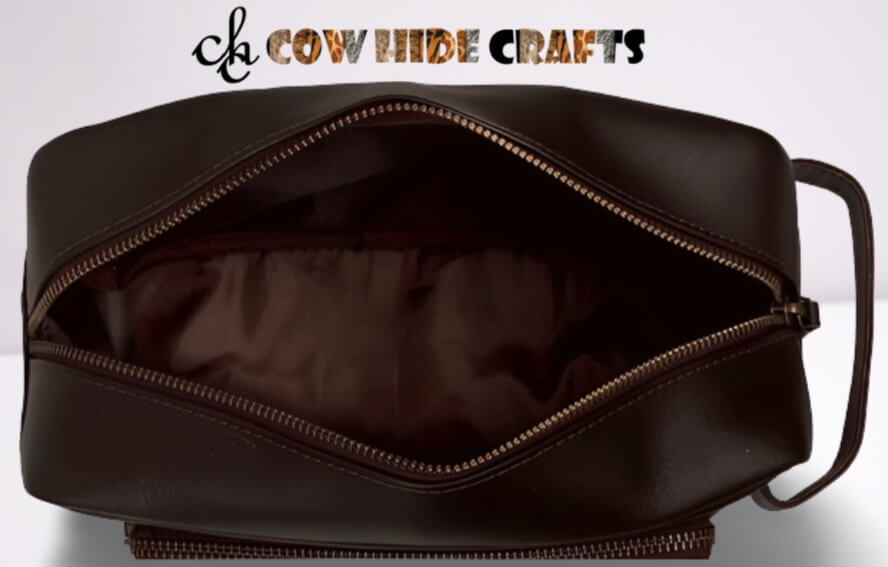 Brown leather dopp bag lined interior zipper pocket