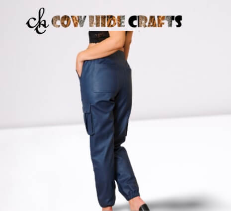 Button closure on blue leather utility cargo pants women