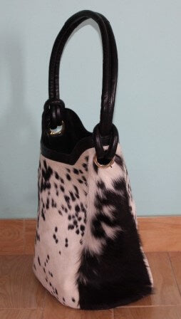 Reinforced black leather base detail of genuine hair-on cowhide cowgirl bucket handbag