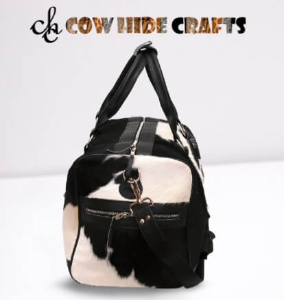 black white cowhide travel duffle