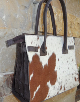 Cowhide bucket bag side snap button adjustment