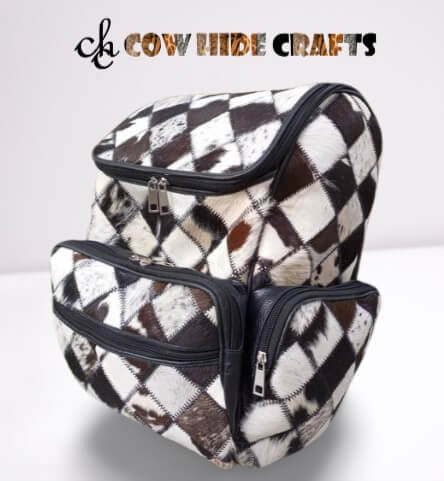 Cowhide patchwork rucksack main zipper closure
