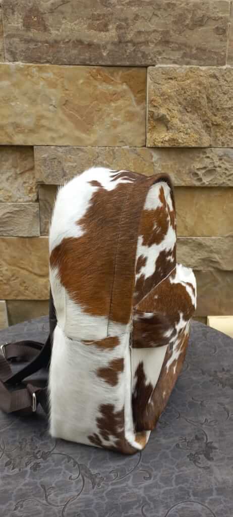 Cowhide sphere backpack outside flap pocket