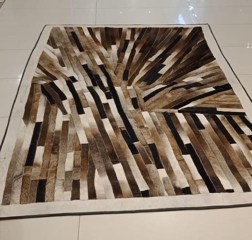 Cowhide starburst rug cream champagne chestnut charcoal