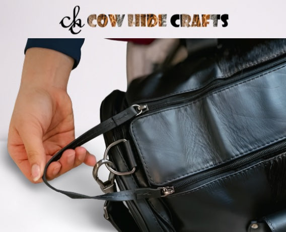 Leather loop on zip puller duffle bag.