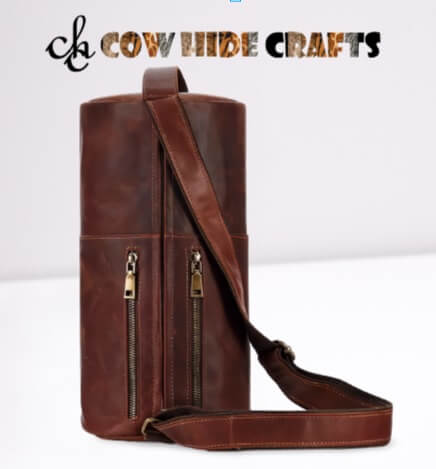 Cylindrical leather bag top handle adjustable strap