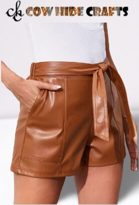 High waist tan leather shorts with leather rope closure detail