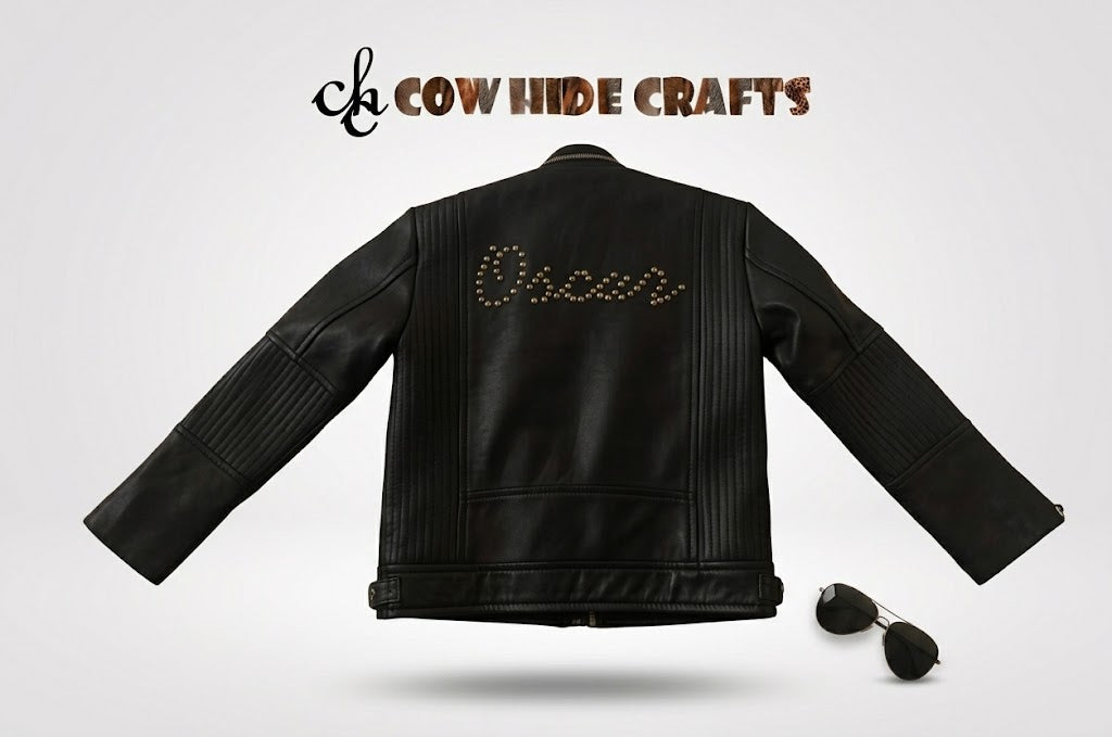 Custom name in cursive metal studding on kids leather jacket back