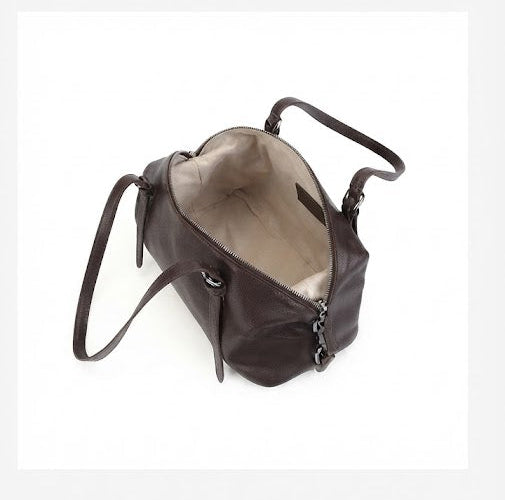 Interior lining with zip pocket inside leather mini duffle bag