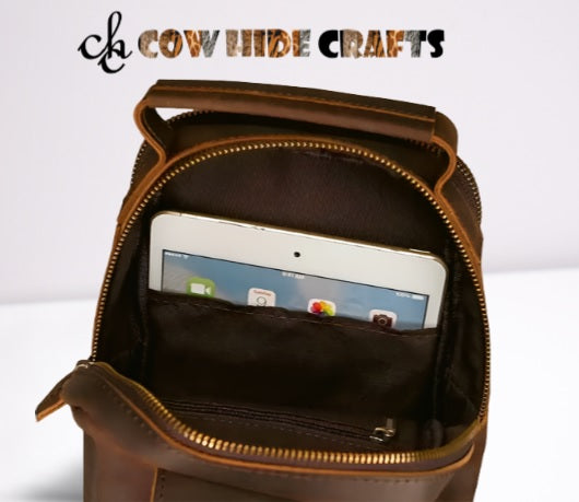 Men leather fanny pack with iPad/tablet gadget.