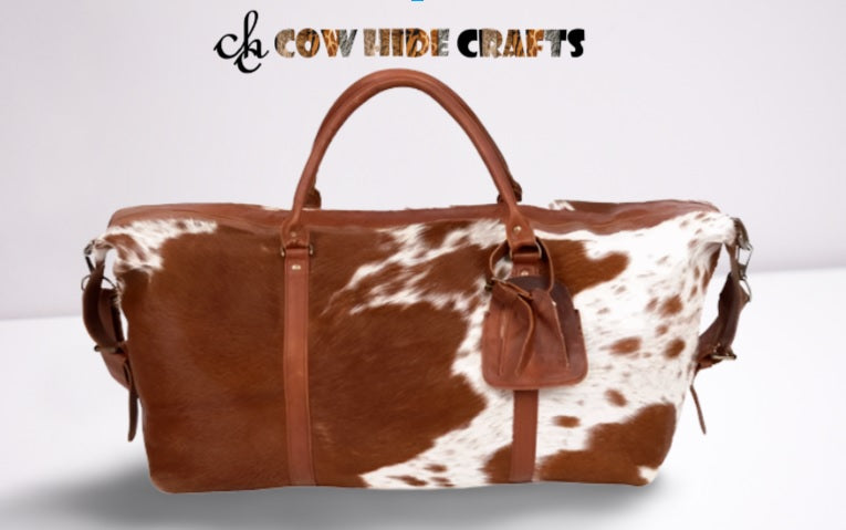 Tan and white cow leather natural hair duffel