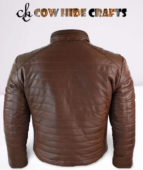 Puffed thermal construction detail on brown leather jacket