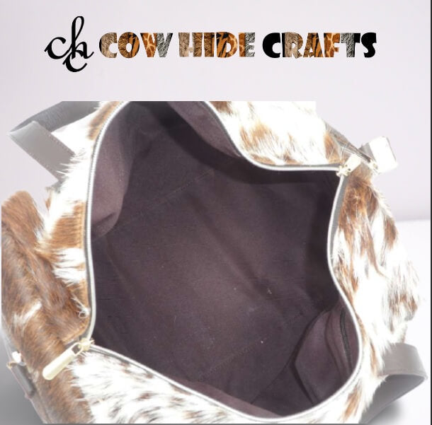 small brown cowhide travel bag