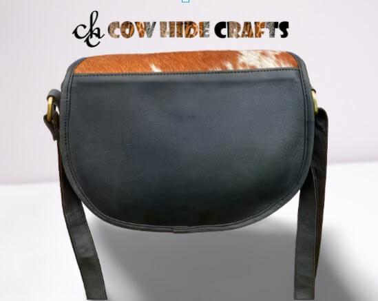 Tan white cowhide D shape bag back view