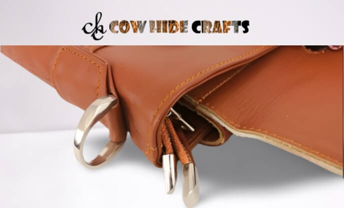 Tan white cowhide laptop case side view