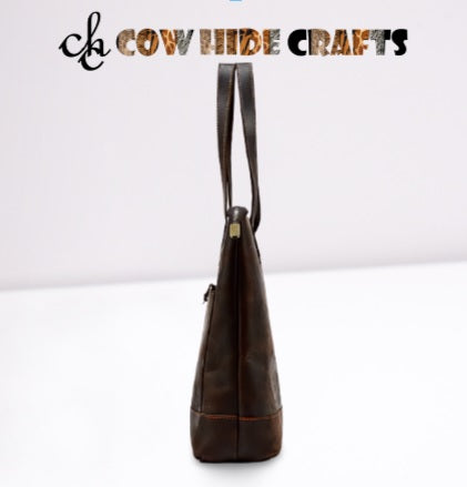 Zipper closure and dual handles on Crazy Horse leather tote