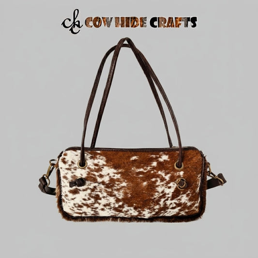 Brown and white hair-on cowhide baguette shoulder bag