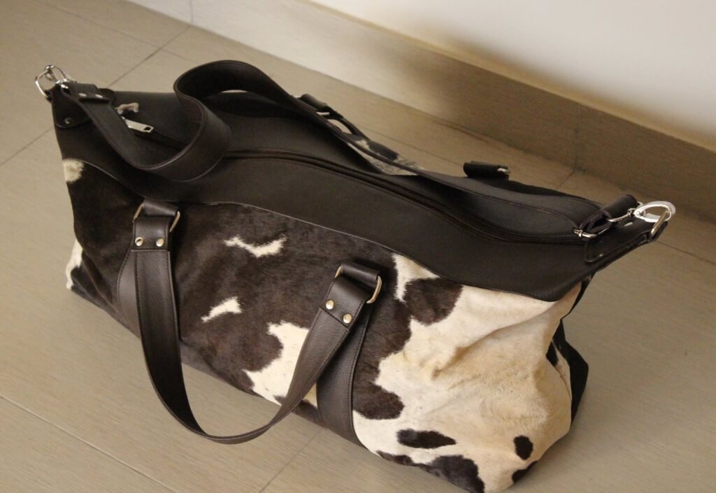 Cowhide leather hunting duffle bag black and white
