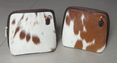 Cowhide bag with outside zipper pocket
