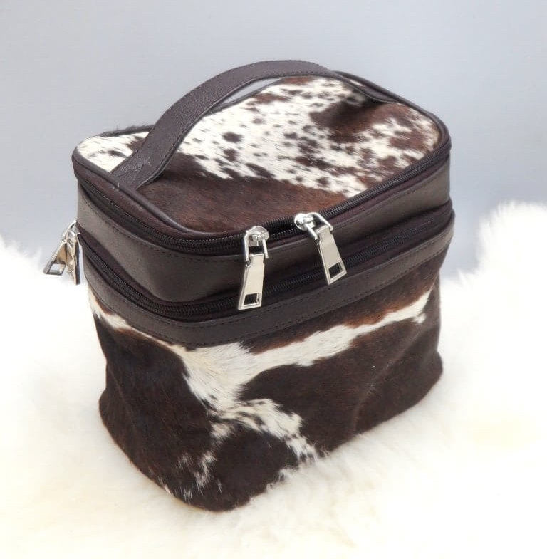 Cowhide makeup bag with dual zipper compartments