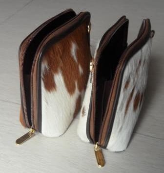 Cowhide mini bag with leather base and gold hardware