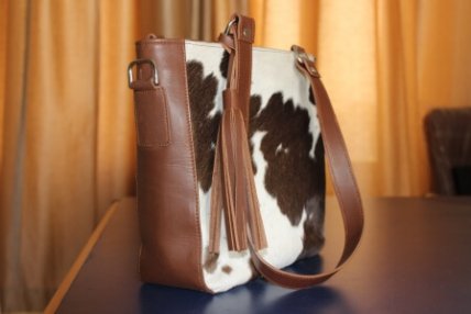 Crossbody partywear purse tan and white cowhide with long strap