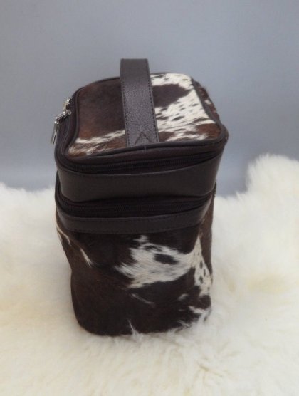 Leather cosmetic bag with brush holders inside