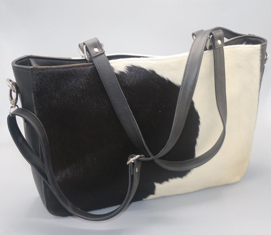 Large cowhide purse with leather shoulder handles