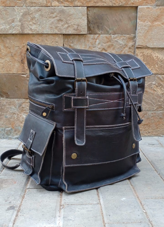 Full-grain leather military rucksack brass buckle flap top