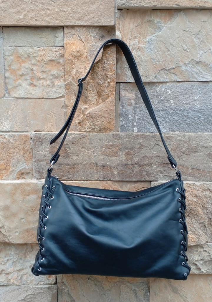Leather slouchy crossbody bag curved full-length zipper