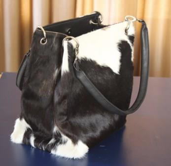Leather bucket purse made from genuine cowhide with magnetic closure