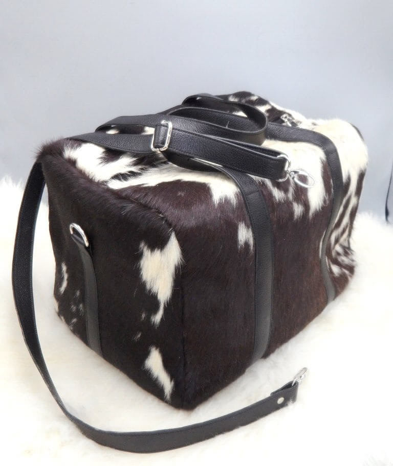 Medium cowhide duffle bag with leather handles