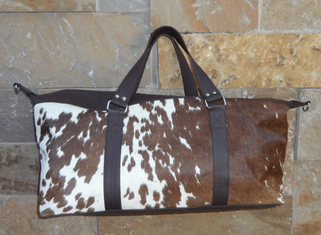 Natural cowhide duffle bag brown and white