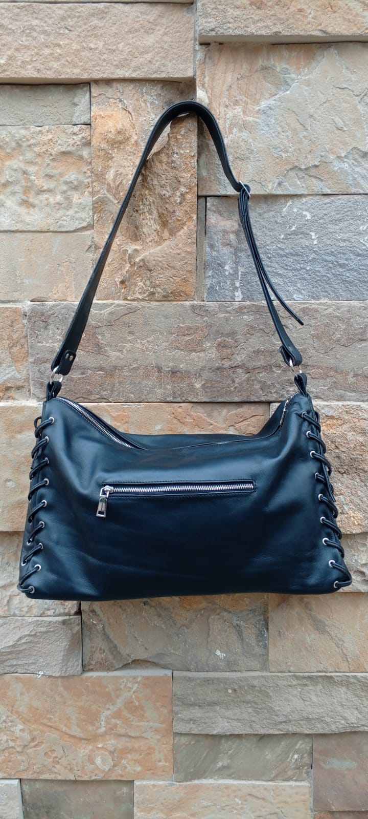 Slouchy leather bag back recessed horizontal zipper security pocket