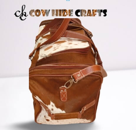 Large overall duffel with side leather handle.