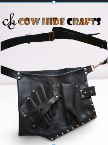 Adjustable waist belt on black leather hairdresser tool pouch
