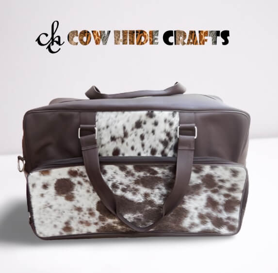Travel cowhide nappy bag