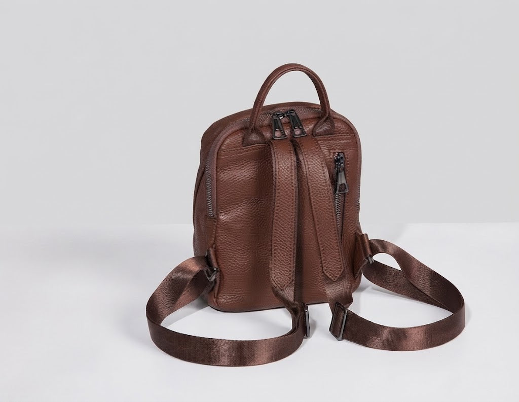 Top handle and accessible zipper pocket on the backside