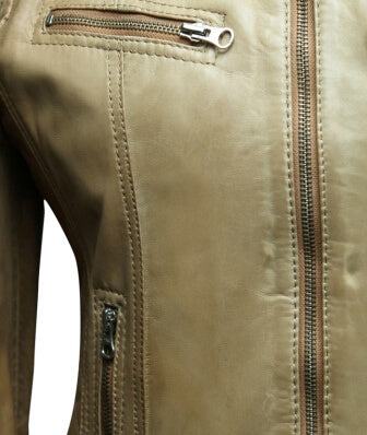 Women's beige leather jacket styled for casual outing