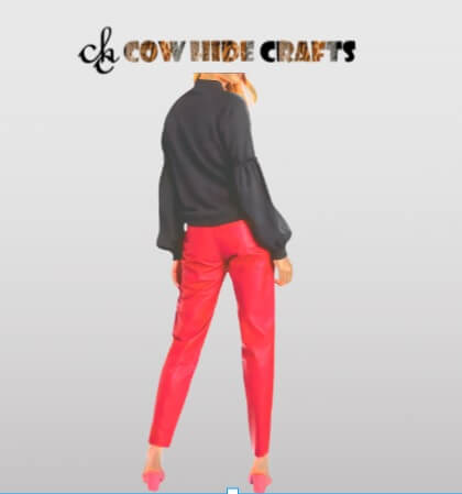 Belt loop system detail on red leather pants women