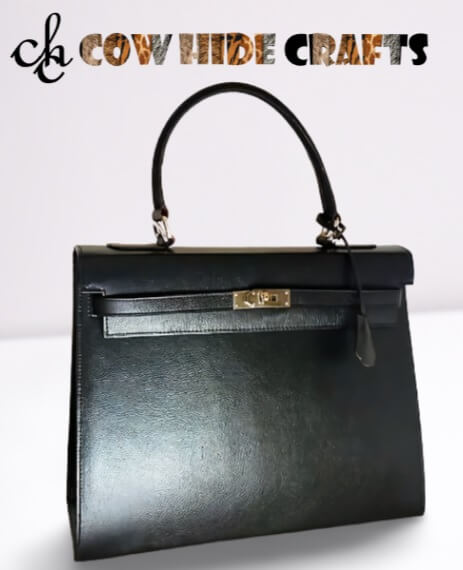 Black box style structured leather handbag front view